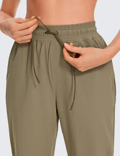 Miniatura 6 de CRZ YOGA Pantalones deportivos para mujer, impermeables, para exteriores, golf, atléticos, ligeros, con bolsillos con cremallera, de 27 pulgadas