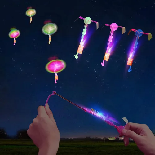 lpvoqpth Juego de 25 juegos de LED voladores, 25 tirachinas + 25 helicópteros brillantes, 50 piezas, juguete volador para exteriores, suministros de