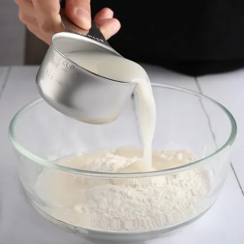 Miniatura 6 de Juego de 7 tazas medidoras de acero inoxidable apilables y resistentes para ingredientes secos y líquidos plateado