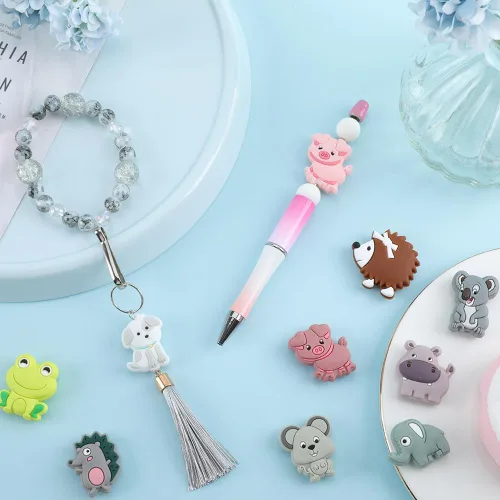 Miniatura 4 de SUNNYCLUE 1 caja de 10 estilos de cuentas de silicona de animales, lindas cuentas focales de silicona de doble cara, dijes de perro de rana, cerdo