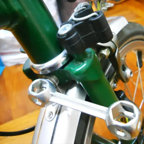 Miniatura 8 de Llave 10 en 1 Herramienta de reparación de bicicletas portátiles con forma de hueso de perro, llave dinamométrica, agujeros hexagonales, llave