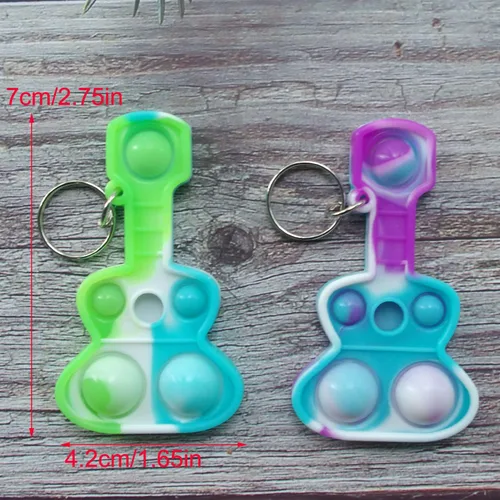 Miniatura 5 de Paquete de 20 llaveros de burbujas para ansiedad con diseño de arco iris a granel, música y guitarra pop, regalo para Pascua, niños y niñas, regalos