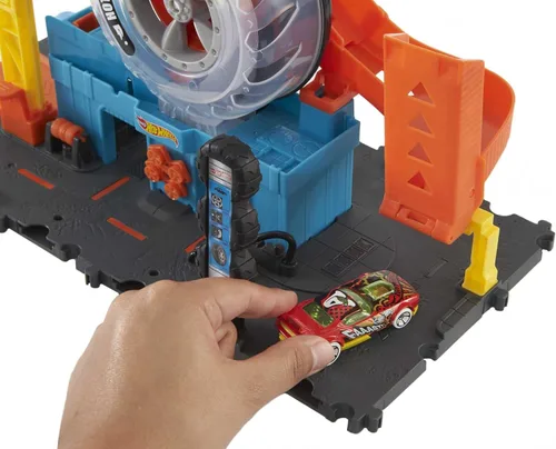 Miniatura 3 de Hot Wheels City Super Twist Tire Shop - Juego de tienda de neumáticos con giro de llave para hacer viajar los autos a través de los neumáticos