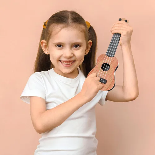 Miniatura 7 de Toddmomy Mini ukelele de juguete para niños de 9.84 pulgadas pequeño modelo de guitarra de plástico instrumento musical juguete educativo