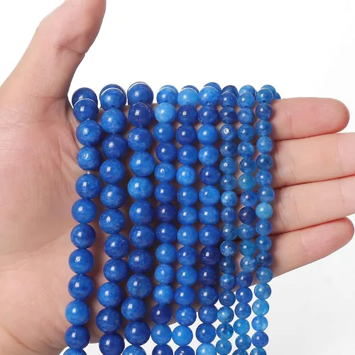 Miniatura 39 de 60 piezas de cuentas de piedra natural de 15⁄64 pulgadas (6 mm) con cuentas de apatita azul que es una piedra para sanación de la energía. Piedras