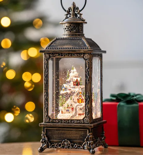 Miniatura 11 de Globo de nieve de Navidad con agua brillante de muñeco de nieve con música y temporizador, linterna iluminada con pilas para regalos de decoración