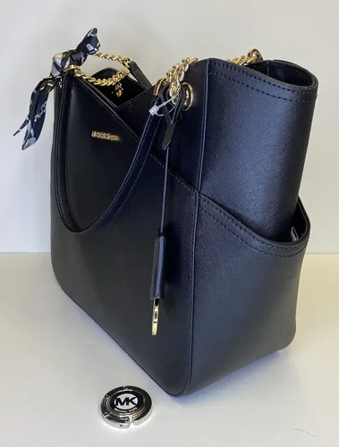Miniatura 7 de Michael Kors Jet Set - bolsa de hombro para viaje con cadena grande, cartera triple Michael Kors Jet Set.