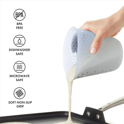 Miniatura 6 de 1 taza de medir de silicón para exprimir y verter, con patrón Stay-Cool, de la marca Oxo Good Grips, Transparente