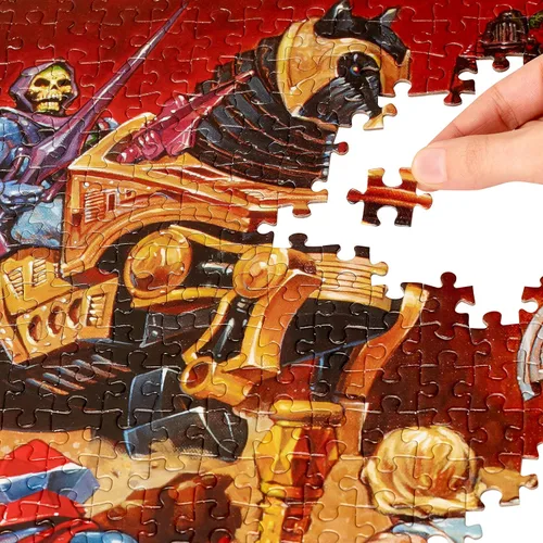 Miniatura 3 de Mattel Games Rompecabezas Mattel de Masters of the Universe con 500 piezas entrelazadas y mini-póster con He-Man y Skeletor, para coleccionistas