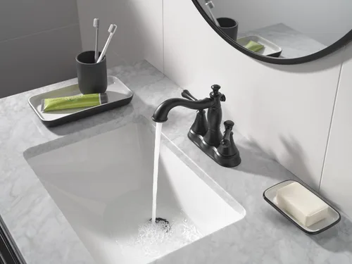 Miniatura 3 de Delta Faucet Cassidy Gold - Grifo de baño central, conjunto de drenaje de metal, bronce champán 2597LF-CZMPU, 5.41 x 6.59 x 5.41 pulgadas Champagne