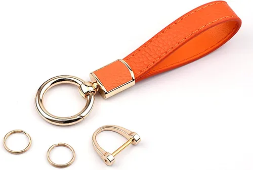 Los soportes de cuero para llavero de automóvil de uso general para hombres y mujeres se pueden girar 360 grados, anillos en D antipérdida, hebilla