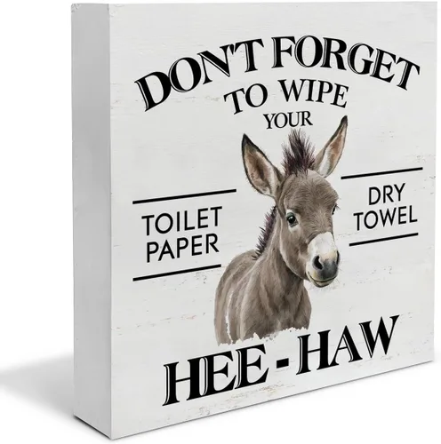 Cartel de madera con texto en inglés "Don't Forget to Wipe Your Higien" («Don't Forget to Wipe Your Higien» («Don't Forget to Wipe Your Higien»)