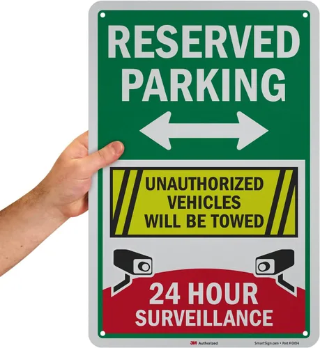 Miniatura 2 de SmartSign Letrero metálico de 18 x 12 pulgadas con texto en inglés «Reserved Parking – Unauthorized Vehicles Will Be Towed, 24 Hour Surveillance