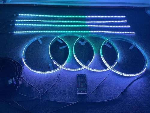 Dream Chase RGB - Juego de 4 luces LED de 15.5 colores multicolor para neumáticos con anillo de rueda + 4 piezas de luces decorativas de 4 pies para