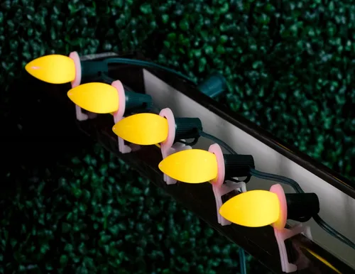 Miniatura 3 de Novelty Lights Paquete de 25 bombillas de repuesto de cerámica C9 para exteriores, color amarillo, base intermedia E17/C9, 7 W