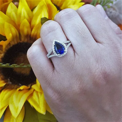 Miniatura 38 de Dazzlingrock Collection Anillo de compromiso con forma de lágrima y diamante blanco natural redondo de 0.45 quilates con halo de diamantes blancos