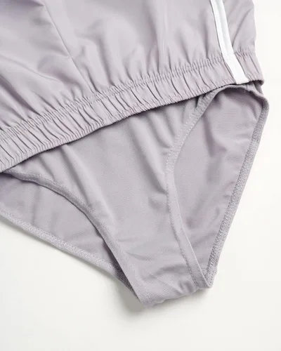 Miniatura 4 de Body Glove Pantalones cortos para niñas, paquete de 4 pantalones cortos de gimnasio con delfín de rendimiento atlético (7-12)