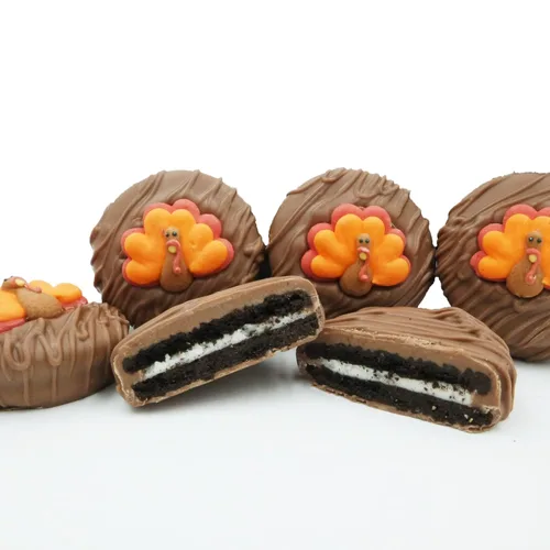 Miniatura 19 de Galletas de la marca Philadelphia Candies cubiertos por ambos lados de chocolate negro y con leche, y crema de cacahuete de la marca Nutter Butter