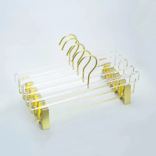HomeCube USA - Percha de acrílico transparente con ganchos y clips dorados, organizador resistente para faldas, pantalones y más, elegante diseño