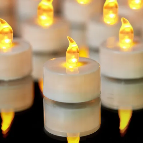 YIWER - Juego de 24 velas de té con batería: Velas de té realistas sin llama parpadeantes con luz amarilla cálida para festivales, fiestas de