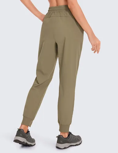 Miniatura 5 de CRZ YOGA Pantalones deportivos para mujer, impermeables, para exteriores, golf, atléticos, ligeros, con bolsillos con cremallera, de 27 pulgadas