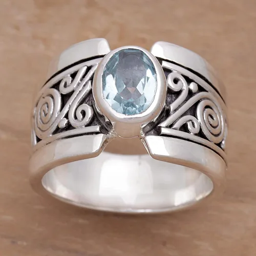 Miniatura 2 de NOVICA Anillo artesanal hecho a mano con topacio azul de una sola piedra de ley .925 ancho con piedra natal de serenidad de Indonesia 'Blue Karma