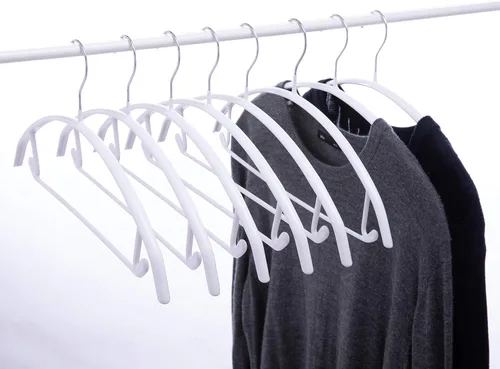 Perchas de metal con revestimiento de goma antideslizante, sin golpes en los hombros, diseño de contorno con barra de pantalones para suéteres y