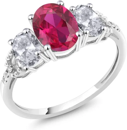 Miniatura 52 de Anillo de compromiso ovalado de oro blanco de 10 quilates con piedra natal y topacio blanco de 3 piedras con detalles de diamante Centro de 0.315