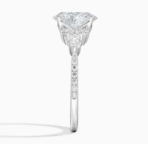 Miniatura 2 de Anillo de compromiso de diamante de cuatro puntas de corte ovalado blanco de 1.06 quilates con certificación IGI con marquesa lateral y diamantes