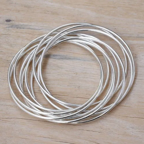 Miniatura 3 de NOVICA Juego de 10 pulseras de plata de ley 925 hechas a mano para mujer, pulseras de plata de moda para mujer, Unión Fortificada, Sin gemas.