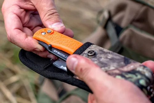Miniatura 5 de Cuchillos Outdoor Edge RazorPro L de caza con cuchilla reemplazable de afeitar ultraafilada, mango naranja antideslizante TRP, funda para cinturón