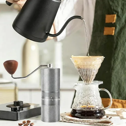 Miniatura 5 de Molinillo de café portátil manual con rebaba cónica de 7 estrellas, ajuste externo de 60 clics, molinillo de café de metal completo para molinillo