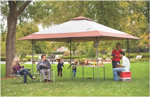 Miniatura 6 de Coleman 13x13ft Instant Canopy Sun Shelter Portable Shade Tent Sets Up in 3 Minutes Vented Roof for Airflow Great for Campsite Backyard Tailgates