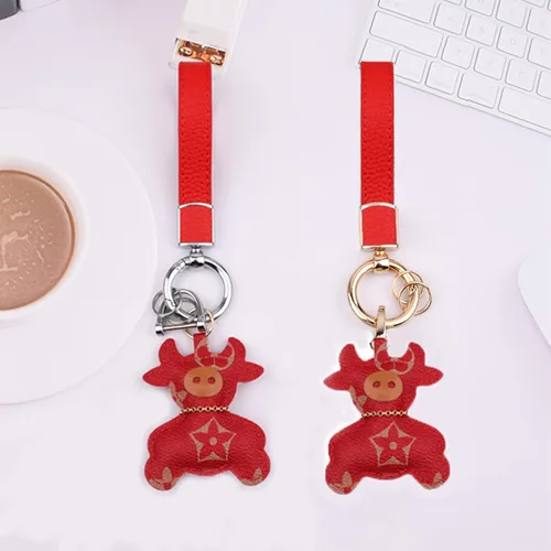 Miniatura 5 de Los soportes de cuero para llavero de automóvil de uso general para hombres y mujeres se pueden girar 360 grados, anillos en D antipérdida, hebilla