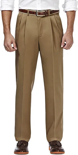 Haggar - Pantalón con parte delantera plana de cintura ampliable de ajuste clásico caqui sin plancha de alta calidad para hombre, tallas regular,