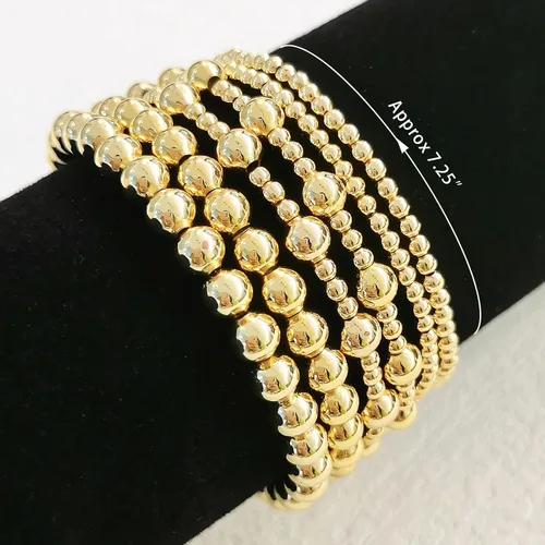 Miniatura 5 de Pulseras de oro para mujer, chapado en oro de 14 quilates, apilables, juego de pulseras elásticas de cuentas de oro, joyería de oro para mujer