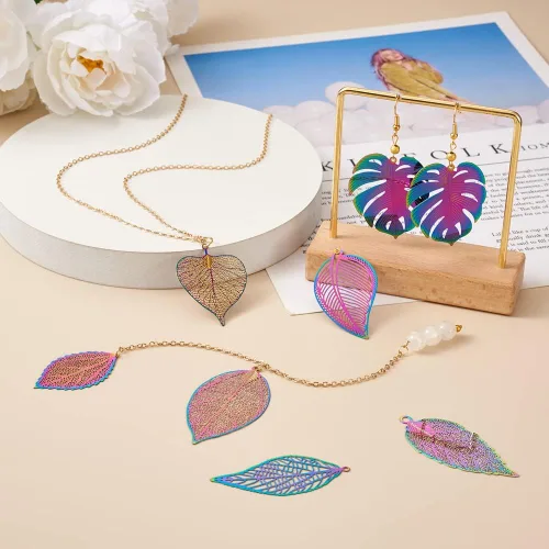 Miniatura 40 de FASHEWELRY 16 dijes de plumas de arco iris de acero inoxidable con alas de filigrana, adornos de metal de 4 colores para hacer joyas, pulseras