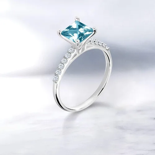 Miniatura 4 de Gem Stone King Juego de anillos de oro blanco de 10 quilates con topacio azul hielo y zafiro blanco creado