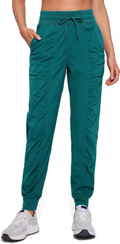 CRZ YOGA Pantalones deportivos ligeros de entrenamiento para mujer, pantalones casuales de cintura alta para correr al aire libre con bolsillos