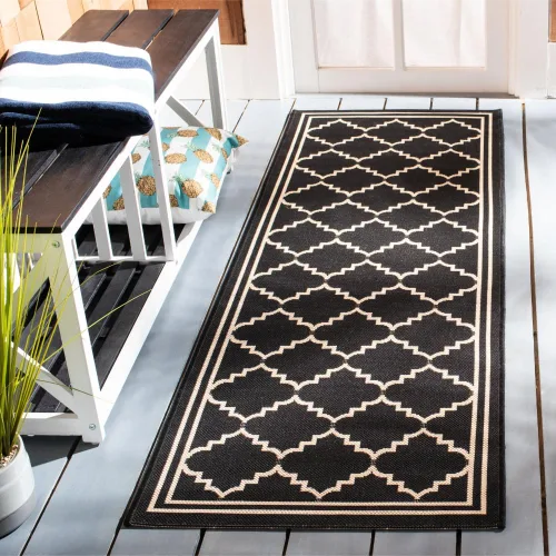 SAFAVIEH Alfombra lavable para exteriores, colección Courtyard de 2.3 x 6.7 pies, color negro y crema, no desprende pelusa y de fácil limpieza,