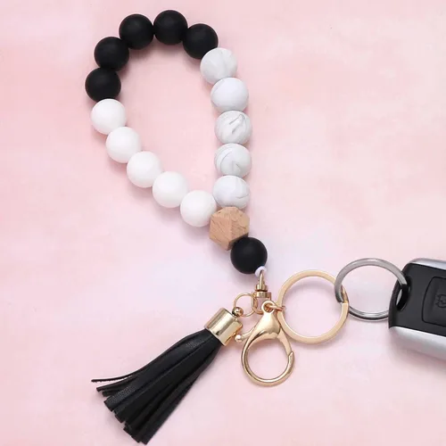 Miniatura 3 de BAOSIWA - Llavero de silicona para mujer, con borla de cuero