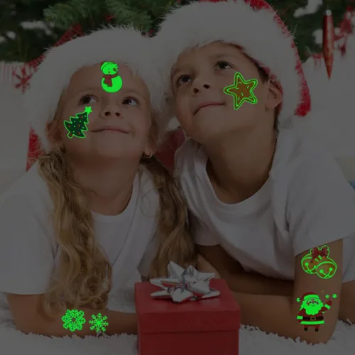 Miniatura 6 de CHARLENT Tatuajes temporales de Navidad que brillan en la oscuridad para suministros de fiesta de niños, 74 hojas individuales, tatuajes luminosos