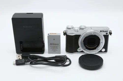 Nikon 1 cámara digital sin espejo J5 (solo cuerpo plateado) Versión internacional (sin garantía)