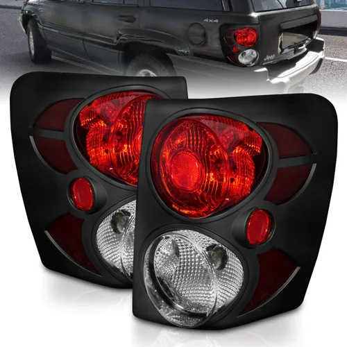 AmeriLite Conjunto de luces traseras de freno de repuesto en negro 3D con relieve para 99-04 Jeep Grand Cherokee - Lado del pasajero y del conductor