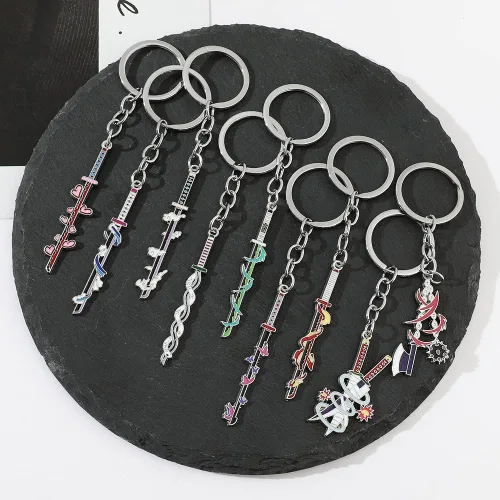 Miniatura 6 de YURAOER Juego de llaveros de anime Slayer Figuras de dibujos animados 9 Hashiras Mini Katana llaveros esmaltados para hombres y mujeres