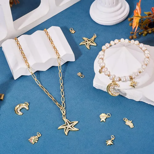 Miniatura 2 de Cheriswelry 8 colgantes chapados en oro de 18 quilates con circonita cúbica, flor, estrella, luna, mariquita, pez, metal, de 0.23 a 0.19 pulgadas