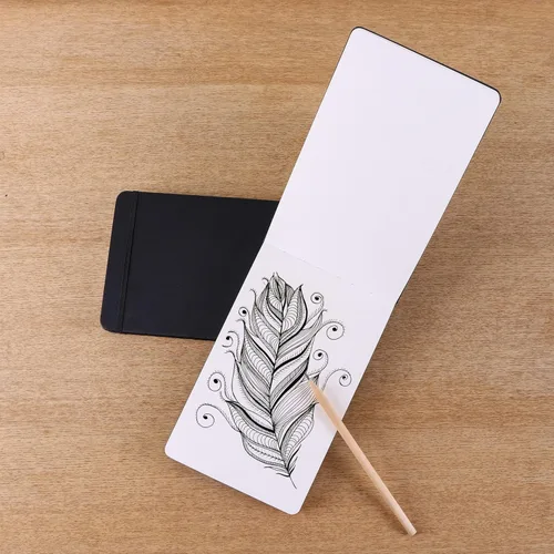 Miniatura 9 de Amazon Basics Cuaderno de bocetos de arte, tamaño L, 5.25 x 8.25 pulgadas, 72 hojas, blocs de bocetos para dibujar, color negro