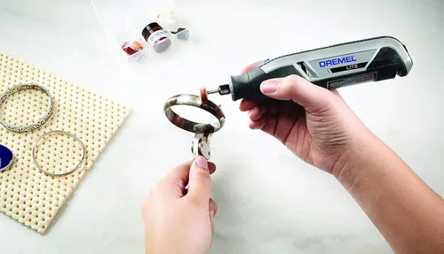 Miniatura 7 de Dremel 709-02 Kit de accesorios de herramientas rotativas multiusos de 110 piezas, incluye una broca de tallado, tambores de lijado, piedras