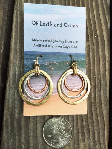 Miniatura 3 de Aretes de amanecer, artesanales, con diseño de círculos bruñidos, bañados en cobre, bronce, y plata.