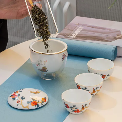 Miniatura 4 de Juego de té de cerámica portátil, juego de tetera de porcelana china de kungfu, tetera todo en uno, colador de té, 3 tazas de té, 1 bolsa de Naranja
